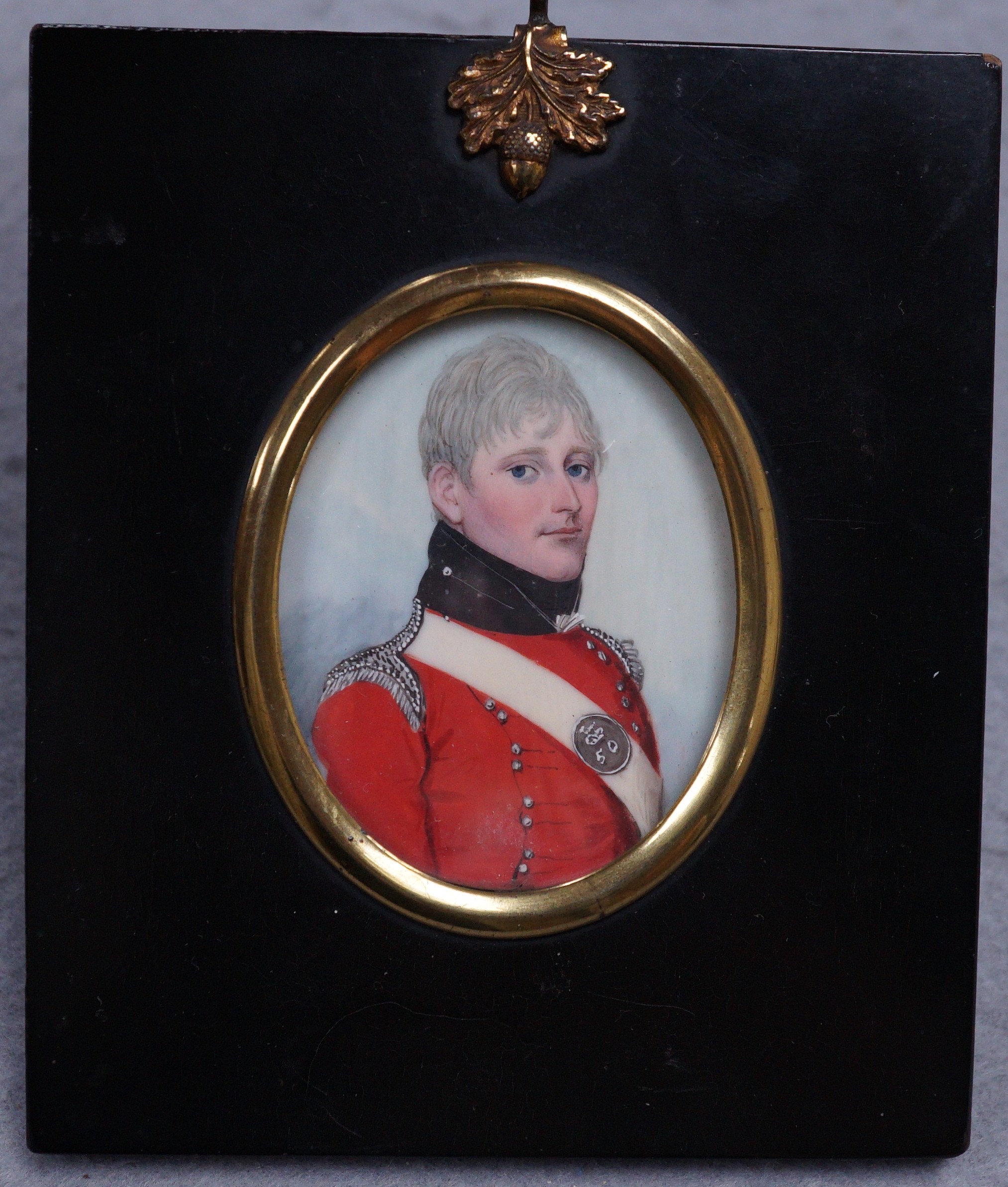 Attributed to Frederick Buck (Irish, 1771-1840), watercolour on ivory portrait miniature of an army officer, 6 x 5cm